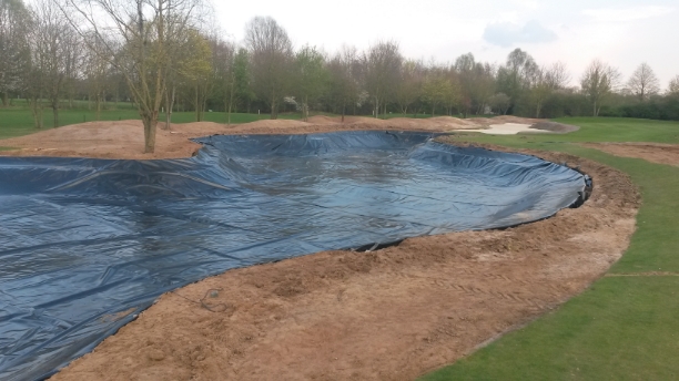 A large greenhouse covered in plastic